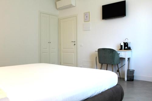 TV a/nebo společenská místnost v ubytování Villa Forte Salvi - Rooms