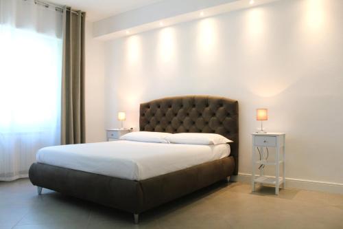 Postel nebo postele na pokoji v ubytování Villa Forte Salvi - Rooms