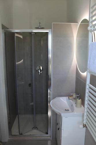 a bathroom with a shower and a sink at Villa Forte Salvi - Rooms in Peschiera del Garda