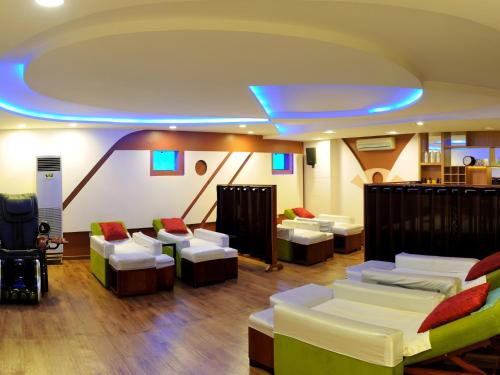 Una cama o camas en una habitación de Elios Hotel