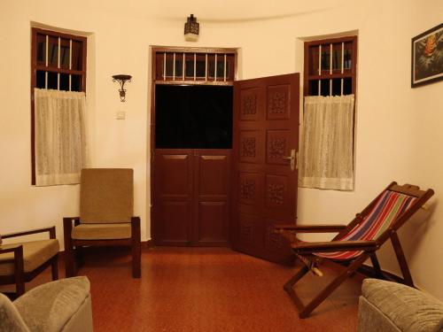 Remasailam Homestay - Thiruvananthapuram , Calm & Blend with Natureにあるテレビまたはエンターテインメントセンター