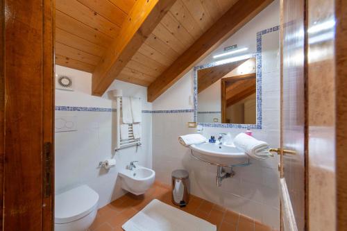 a bathroom with a sink and a toilet at Villa Isabella Minori in Minori