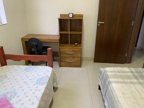 Katil atau katil-katil dalam bilik di Apartamento terreo com quintal individual