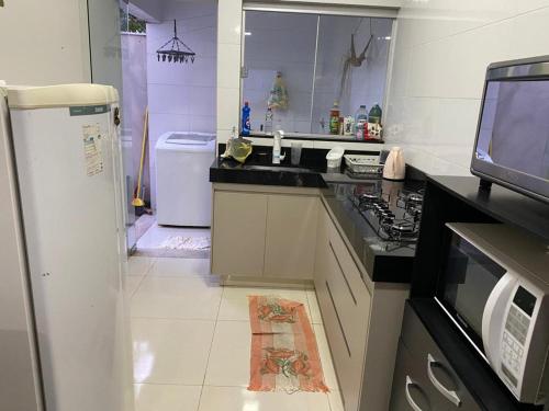 Dapur atau dapur kecil di Apartamento terreo com quintal individual