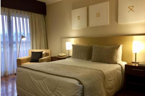 Postel nebo postele na pokoji v ubytování Hotel Paulista Plaza MCR