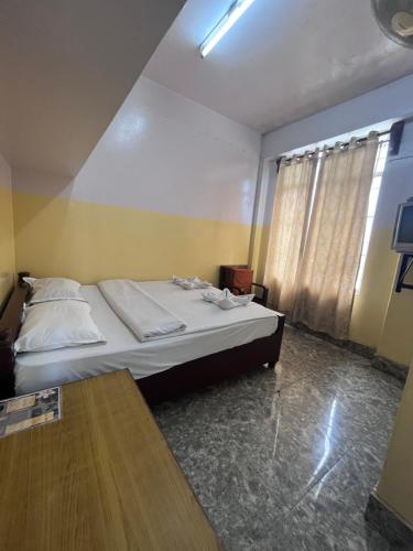Katil atau katil-katil dalam bilik di JN Hotel
