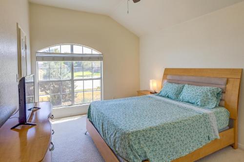 a bedroom with a bed and a window at Lovely Killeen Retreat with Brick Fireplace! in Killeen