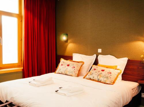 Gran Hotel De Passageにあるベッド