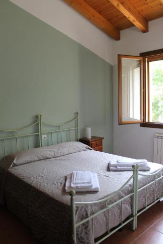 Una cama o camas en una habitación de La Rizza