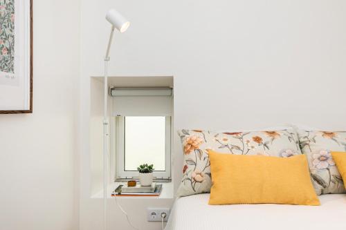 Postel nebo postele na pokoji v ubytování Adraga Patio House