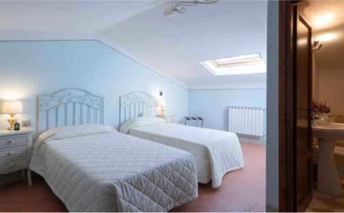 Postel nebo postele na pokoji v ubytování Villa Gerini