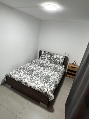 Säng eller sängar i ett rum på Alexa Residence - Appartement 1