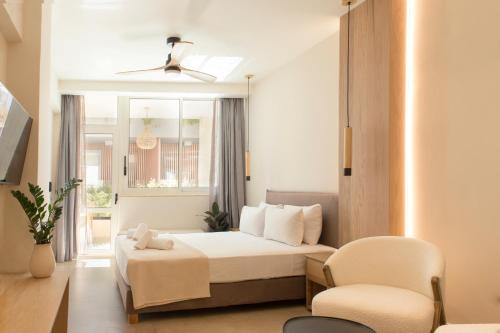 Postel nebo postele na pokoji v ubytování Living Stone Condo Hotel