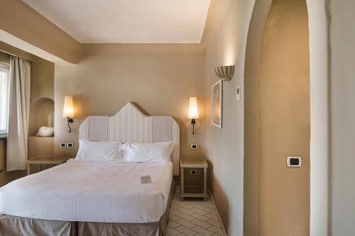 Voodi või voodid majutusasutuse Therasia Resort Sea and SPA - The Leading Hotels of the World toas