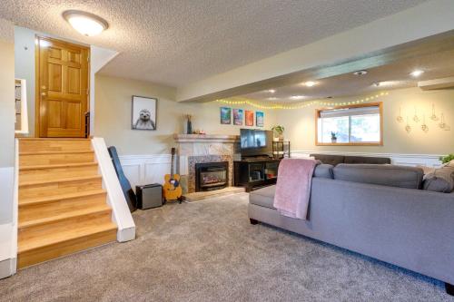 a living room with a couch and a fireplace at Furnished Deck and Fire Pit Thornton Family Retreat in Thornton