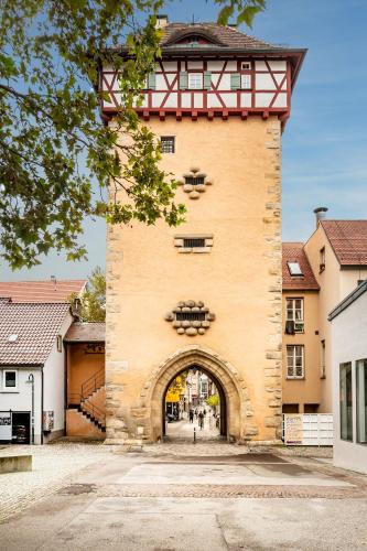 an entrance to a building with an archway at Aspire Castillo Reutlingen, Trademark Collection by Wyndham in Reutlingen