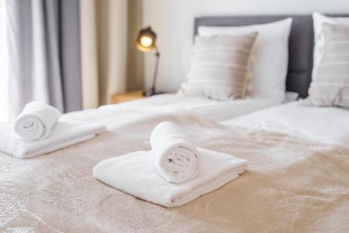 Katil atau katil-katil dalam bilik di Apartament Przy Plaży z Darmowymi Rowerami 109 by Perłowa Przystań Rent