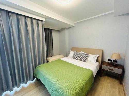 Katil atau katil-katil dalam bilik di 清迈一号 The One ChiangMai 1B1B Studio 一环商业中心, 紧邻尚泰繁华