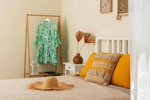 Una cama o camas en una habitación de Amelia Villa Collection