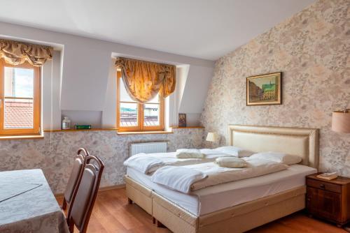 En eller flere senge i et værelse på Kazimierz Secret