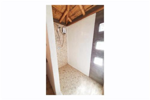 a corner of a room with a white wall at Oasis de Vichayito in Vichayito