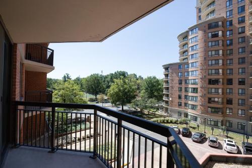 a balcony with a view of a city at Unique Luxury Apt with Rooftop @Pentagon City in Arlington