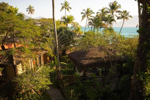 a view of the ocean from a resort at Porto Pacuíba Hotel in Ilhabela