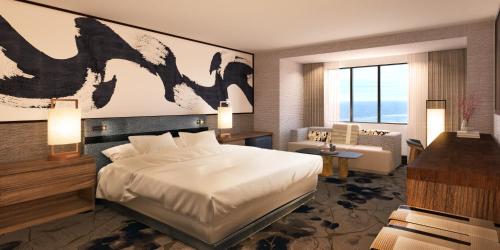 a bedroom with a bed and a living room at Nobu Hotel at Caesars Atlantic City in Atlantic City