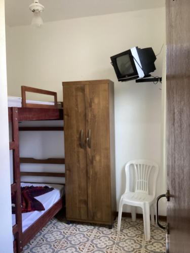 Postel nebo postele na pokoji v ubytování POUSO CENTRO - Pouso dos Viajantes Unidade Centro OuroPreto