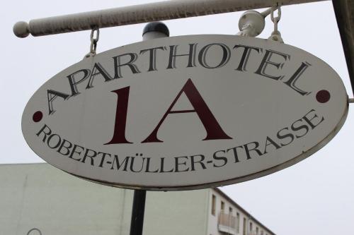 a sign on a building that says "don't drink" at APARTHOTEL 1A in Zwickau