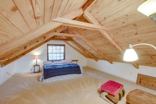 a bedroom with a bed and a wooden ceiling at Serene South Lake Tahoe Getaway with Spacious Deck! in South Lake Tahoe