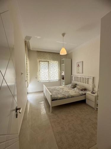 Postel nebo postele na pokoji v ubytování Yekta Alara Park