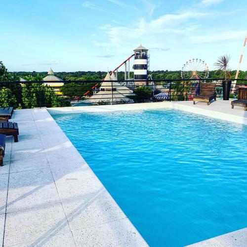 a large swimming pool with a roller coaster at Vivanco 1555 Tigre Centro 1 in Tigre