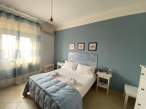 Una cama o camas en una habitación de La Terrazza di Pollon