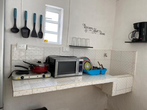 Cuisine ou kitchenette dans l'établissement La casa de las muñecas