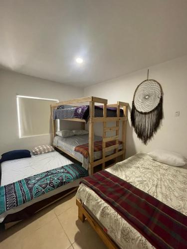 Postel nebo postele na pokoji v ubytování Home Sweet Caribbean