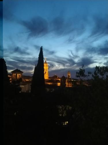 a view of a building at night with a cloudy sky at LA CASA DEL VIENTO ATQ in Antequera