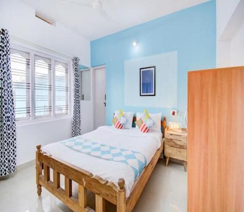 Postel nebo postele na pokoji v ubytování Coorg Dream Land Homestay by StayApart, Kushalnagar