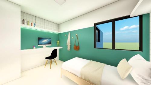 a bedroom with a bed and a window at Barão da torre in Campos dos Goytacazes