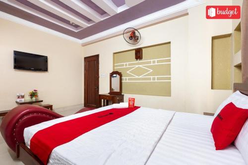 Giường trong phòng chung tại Nguyên Khang Hotel