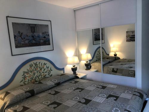 Letto o letti in una camera di Villa d'Este attico con piscina rooftop