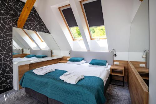 Postel nebo postele na pokoji v ubytování Hotel Limanova