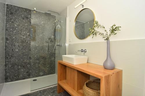 a bathroom with a sink and a shower at Villa Vela Baraka - Happy Rentals in Dragove