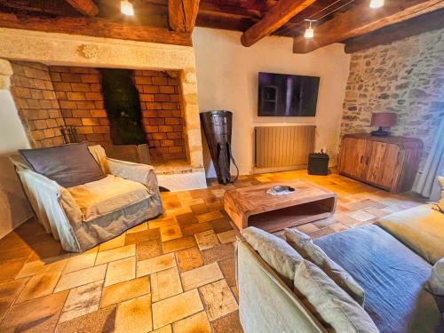 Χώρος καθιστικού στο Maison provençale avec Piscine intérieure, spa et hammam à deux pas d'Uzès