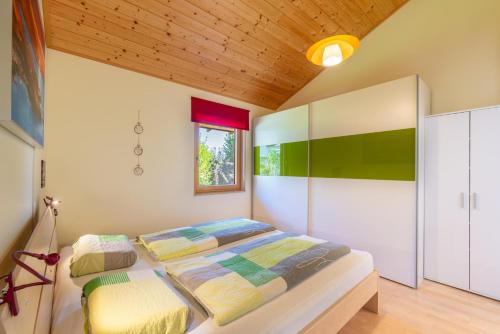 Ένα ή περισσότερα κρεβάτια σε δωμάτιο στο Ferienhaus Sonnenwiese