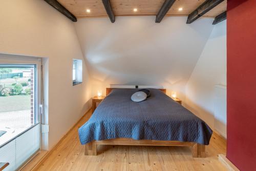 Postel nebo postele na pokoji v ubytování Möwenhaus