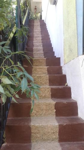 a set of stairs leading up to a house at Udessa Rest Ella in Ella