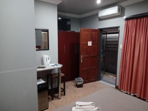 Fotografie z fotogalerie ubytování Grand Central Guesthouse v destinaci Rustenburg