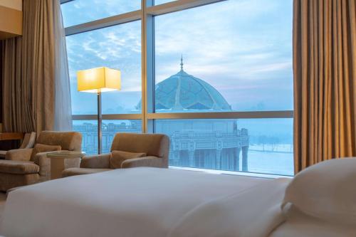 Postel nebo postele na pokoji v ubytování Hyatt Regency Dushanbe