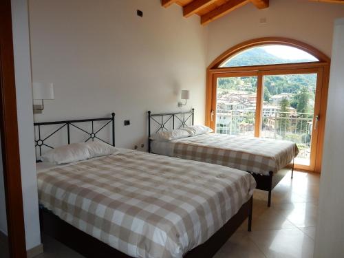 Ліжко або ліжка в номері Villa Primula